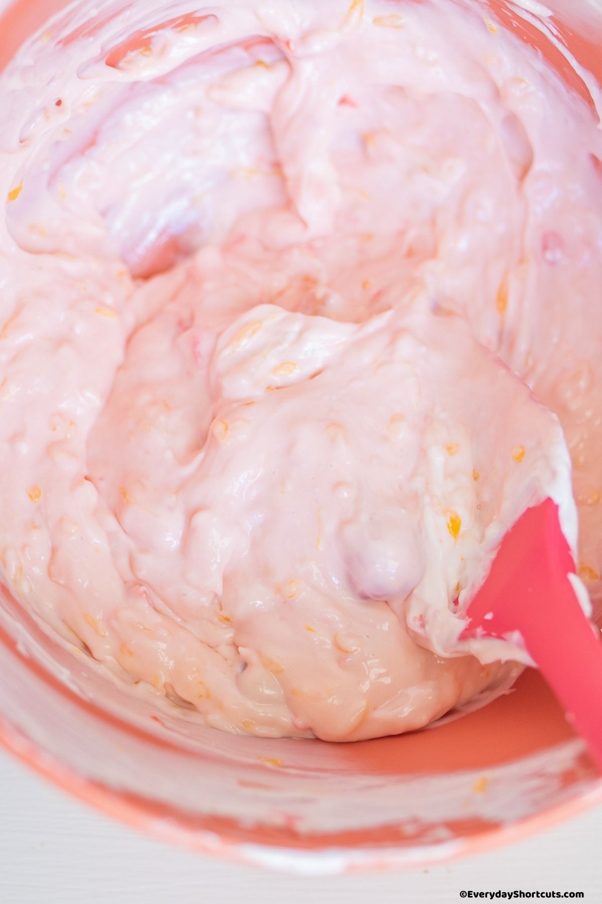 pink fruit dip in a bowl