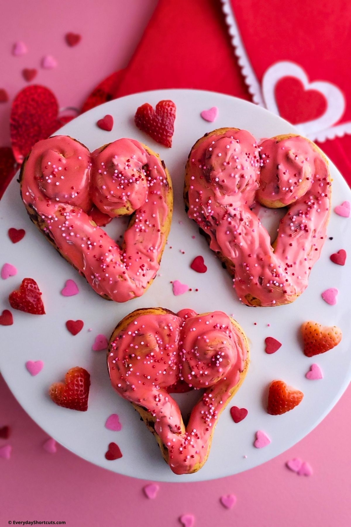 Valentine breakfast pastry rolls with pink icing