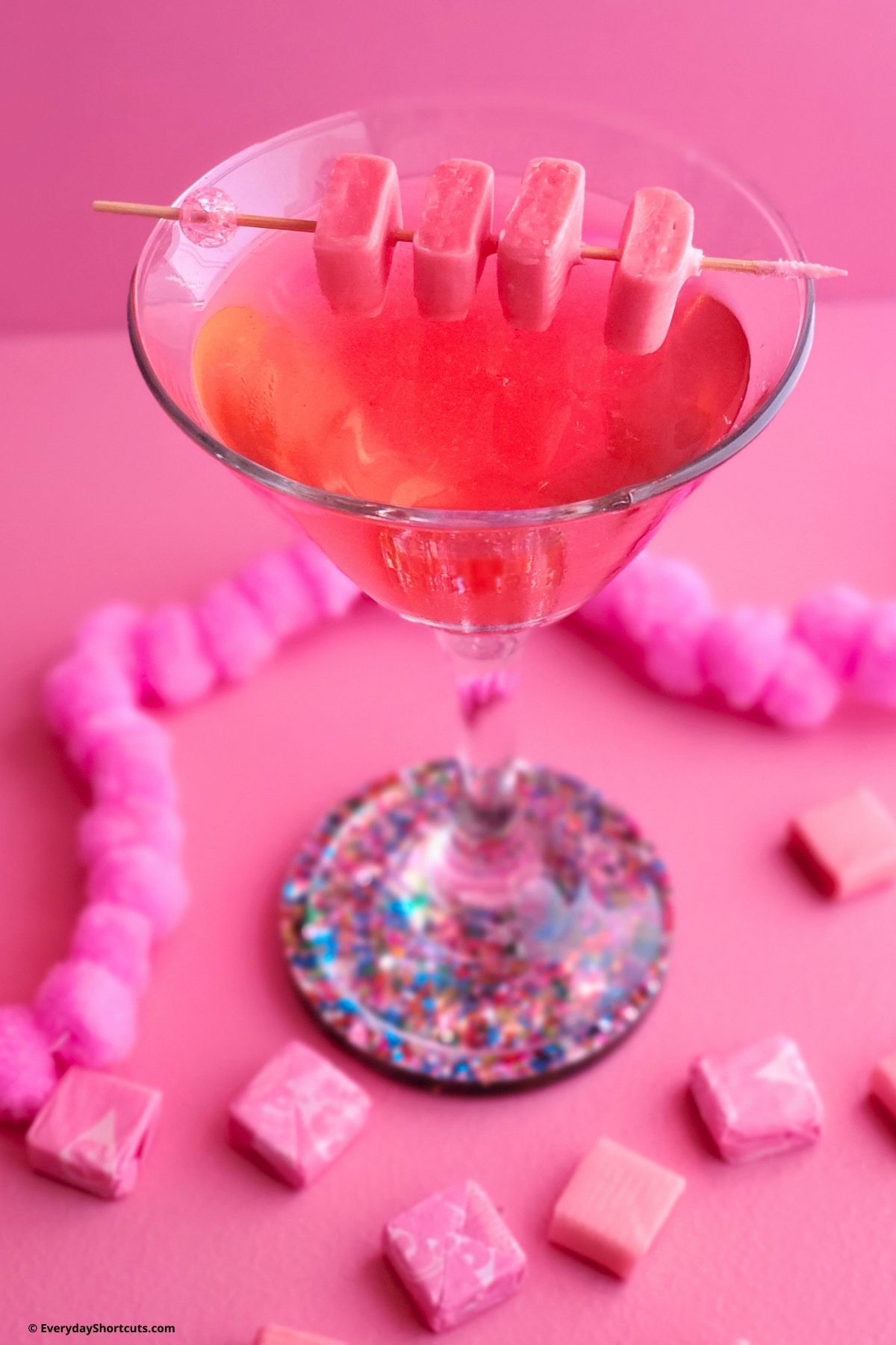 martini with pink starburst