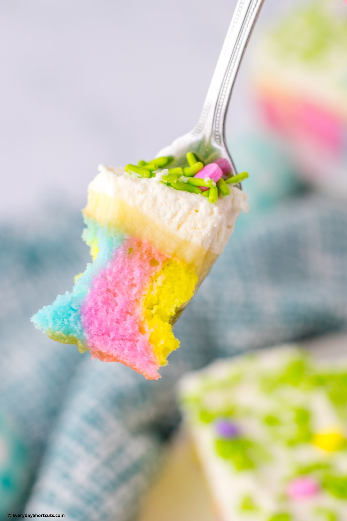 piece of Easter poke cake on a fork