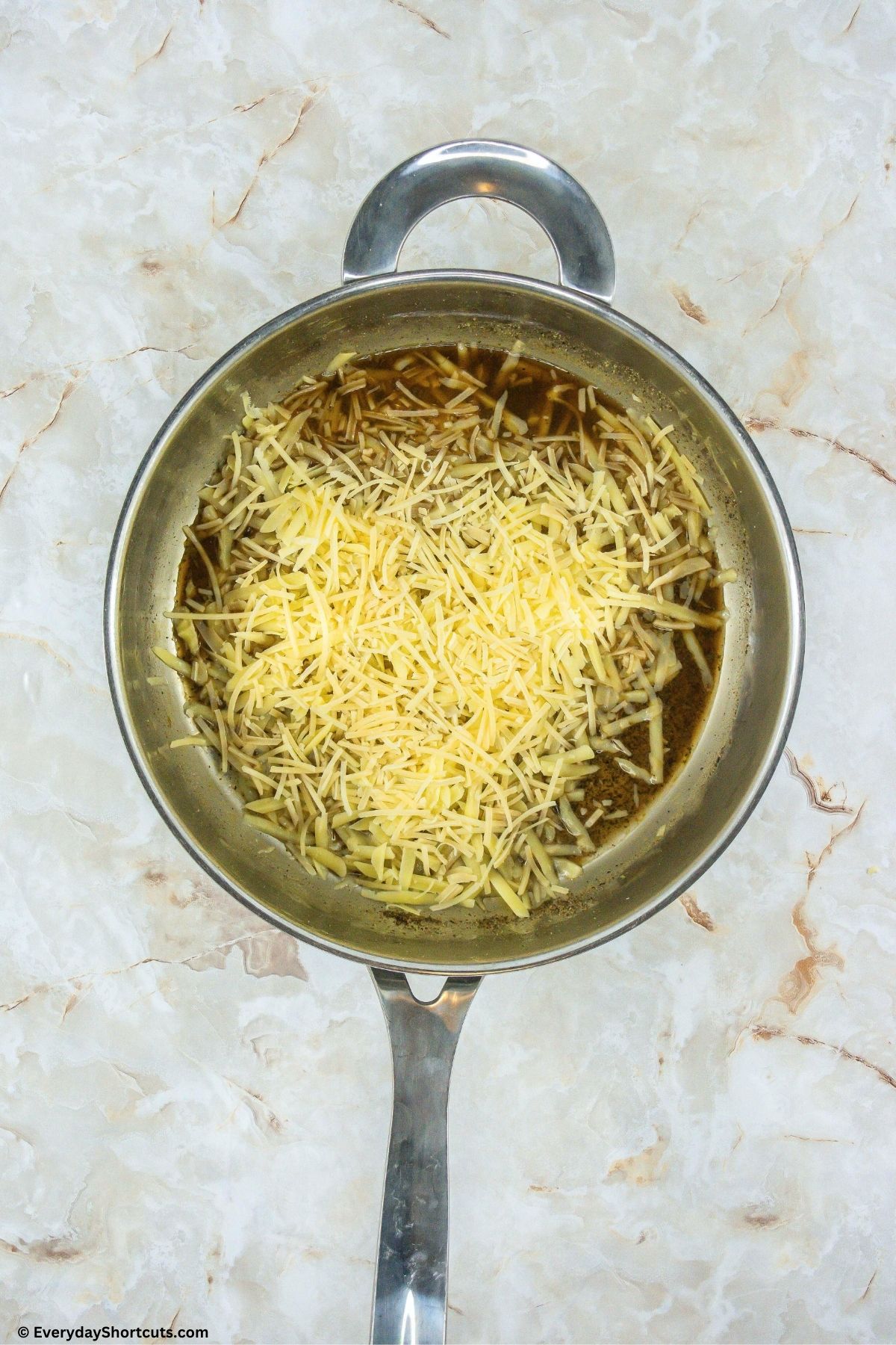 Parmesan cheese and pecorino cheese in a pan
