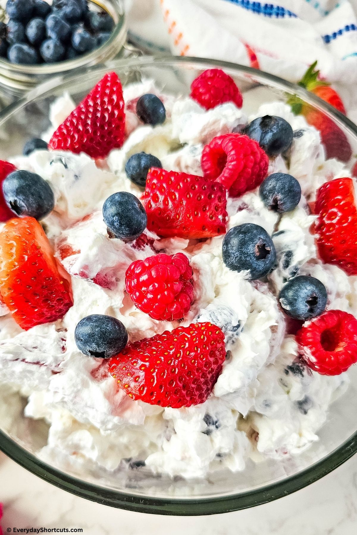 red white and blue cheesecake salad with berries