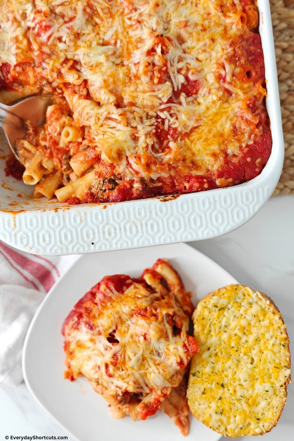 cooked ziti casserole and single serving on plate