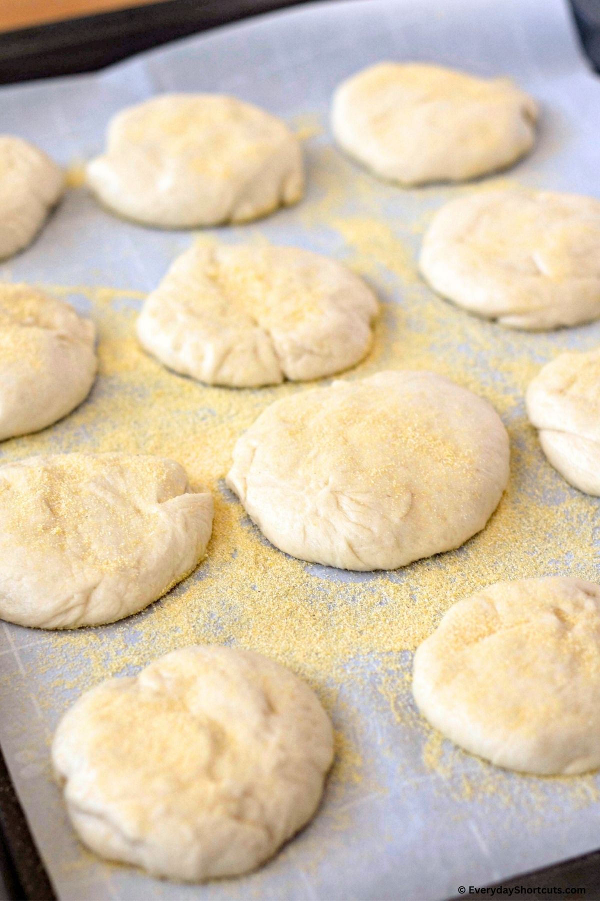 English muffins discs with cornmeal