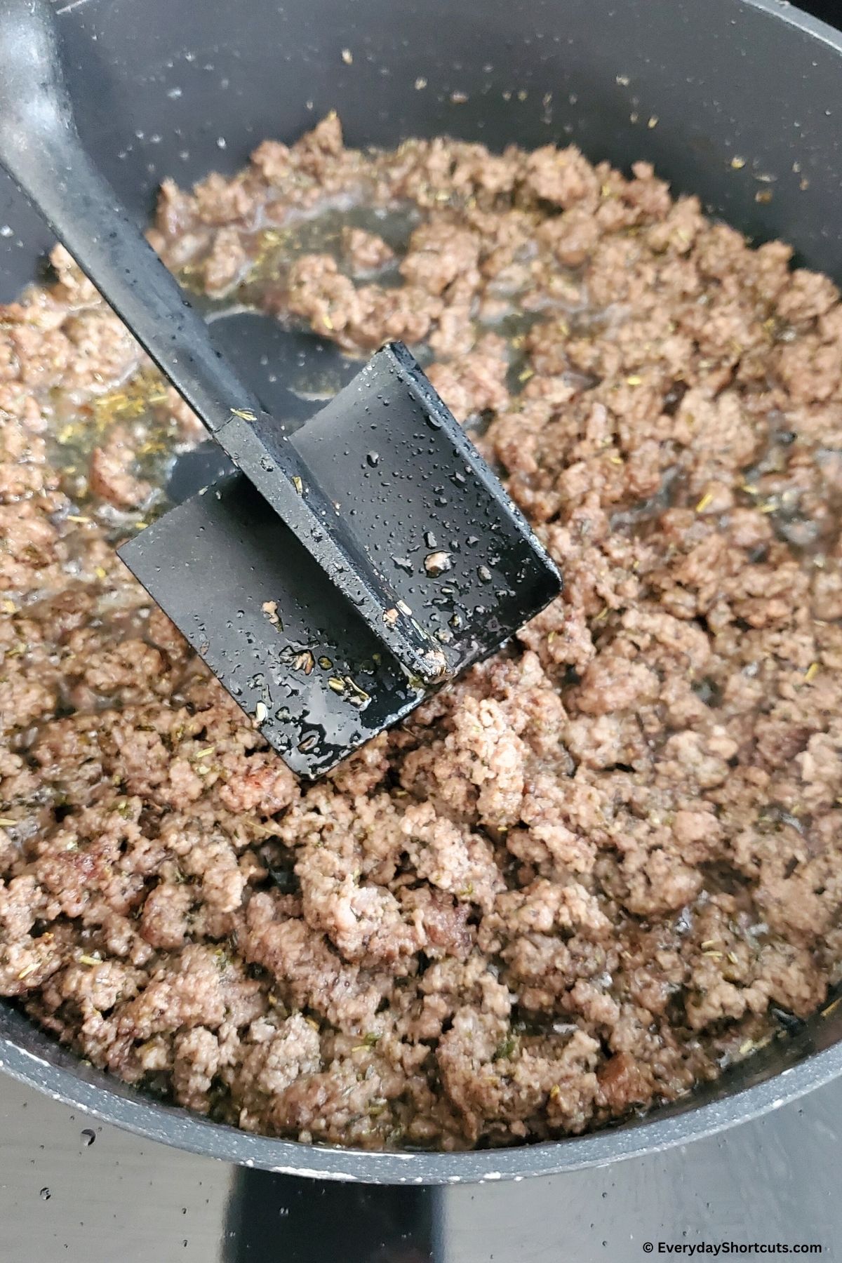browned ground beef in pan