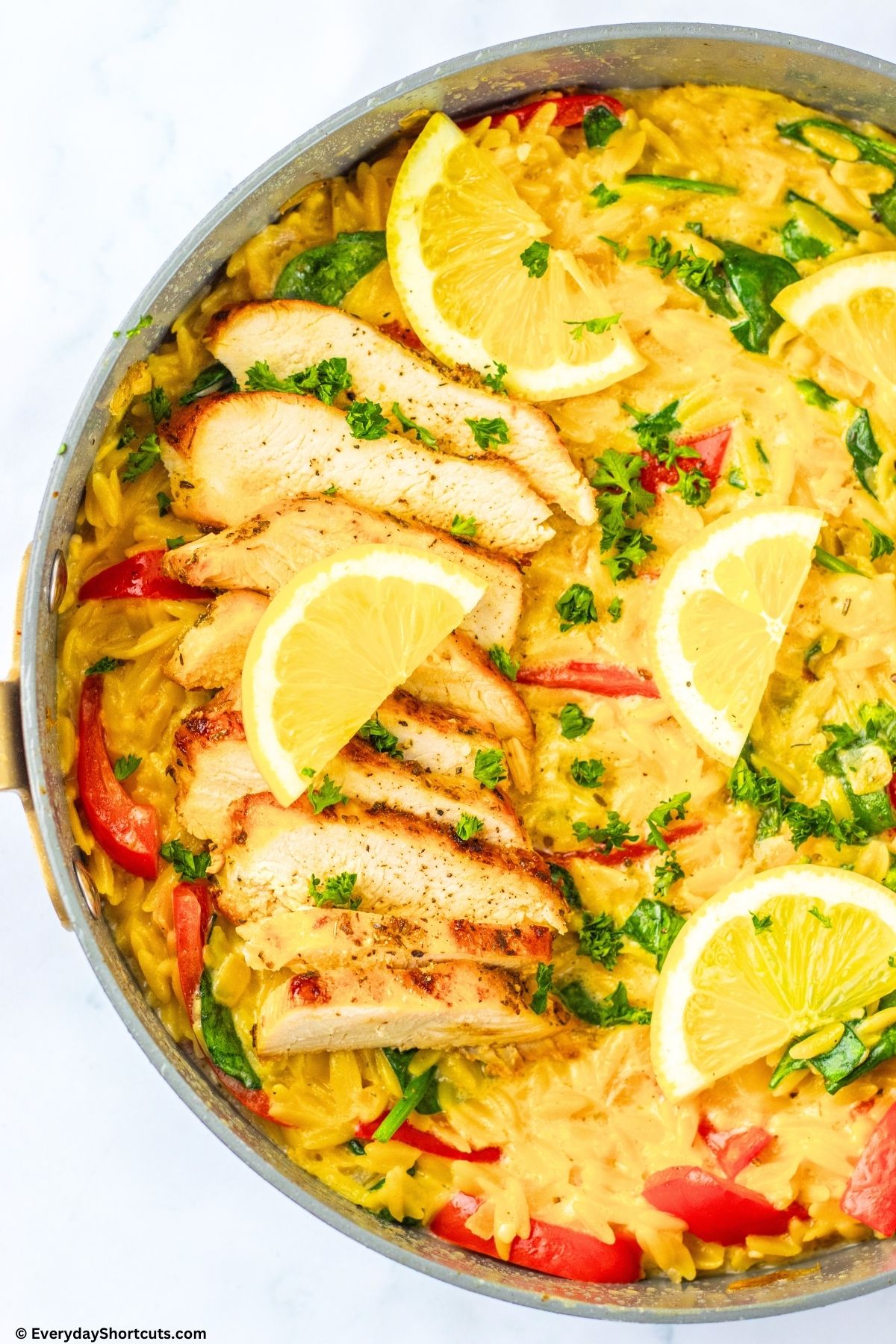cooked lemon chicken orzo in pan