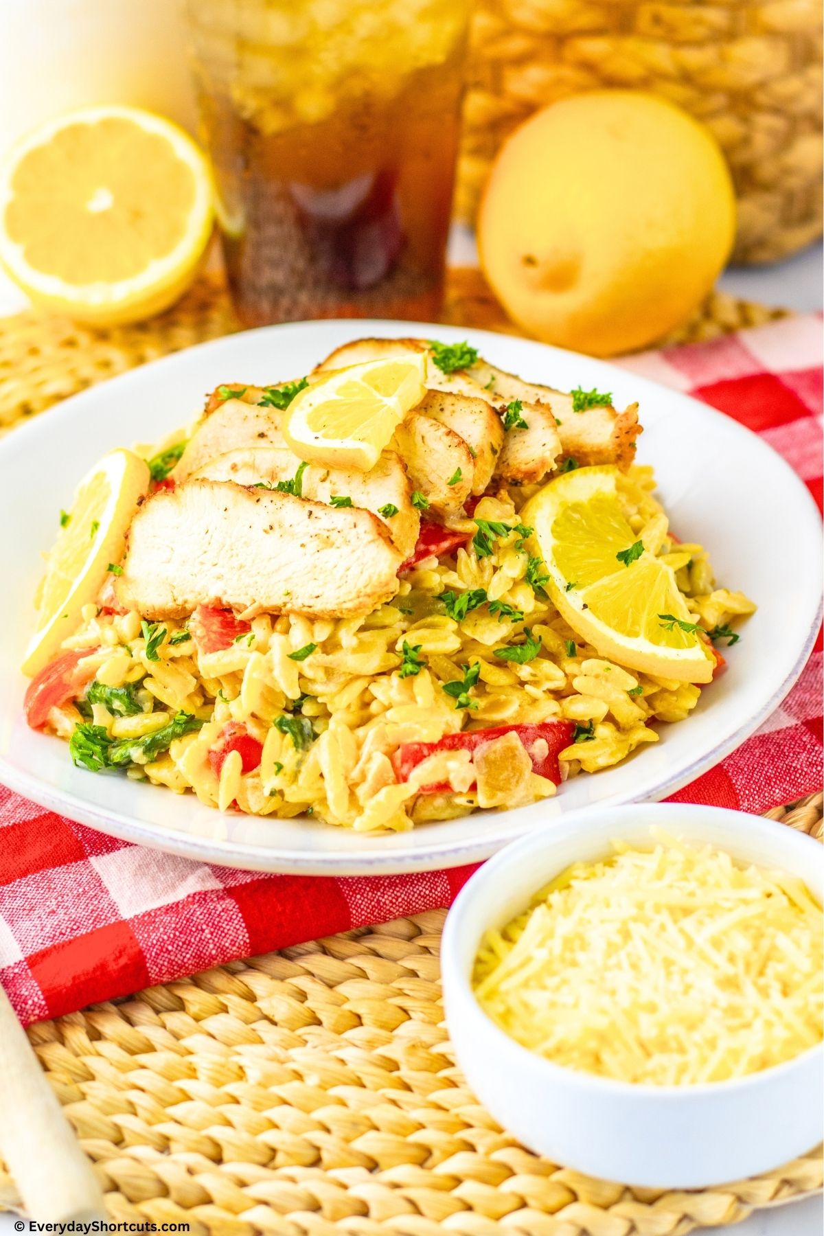 orzo with lemon chicken on a plate