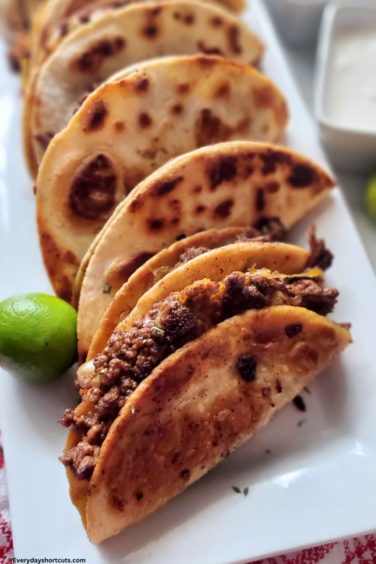 crispy beef tacos on a plate