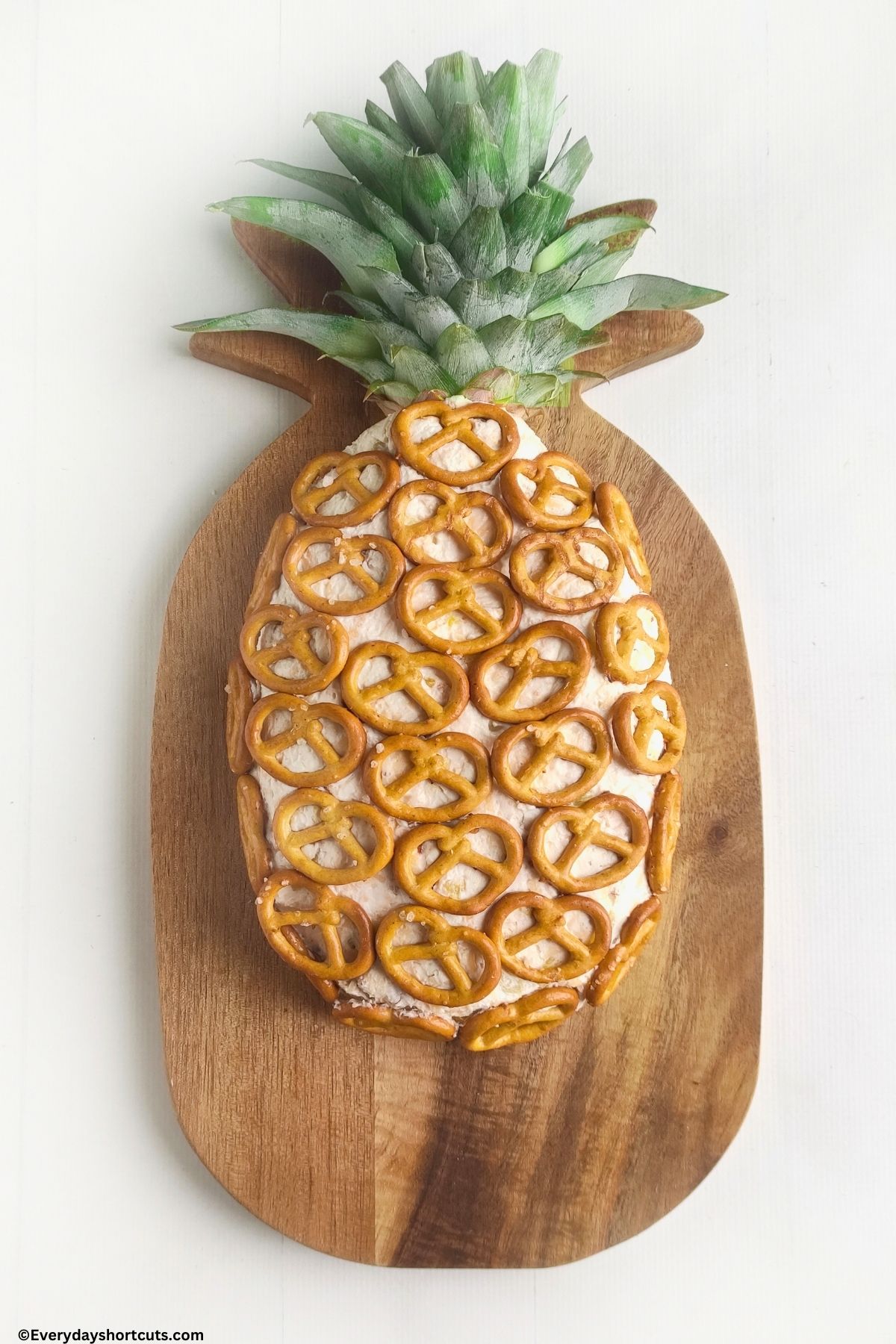 Hawaiian cheese ball on a board