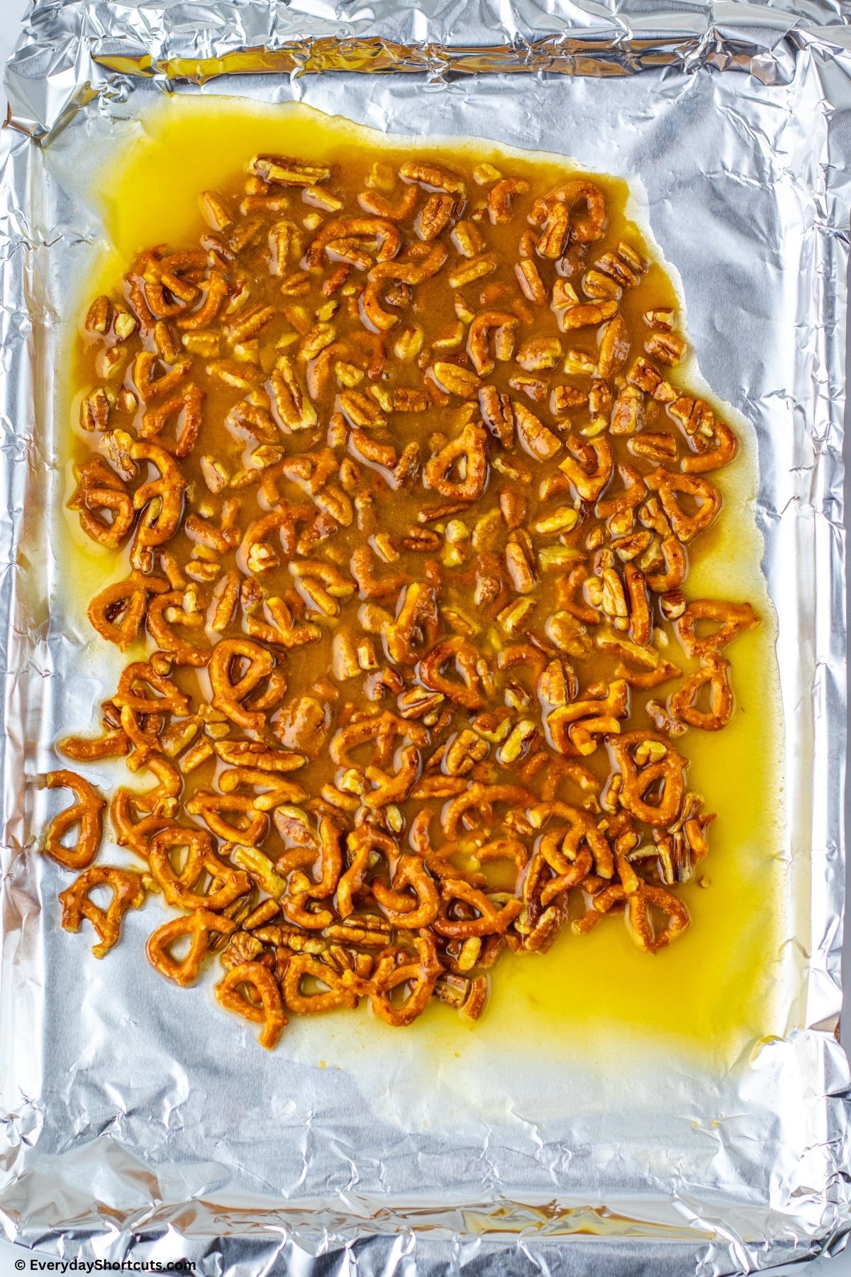 pretzels and butter mix on a tray