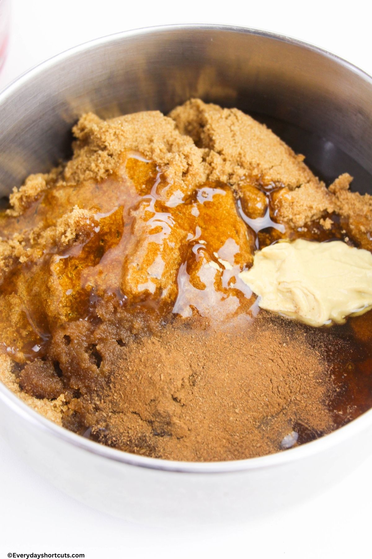 brown sugar honey cloves and dijon mustard in a bowl