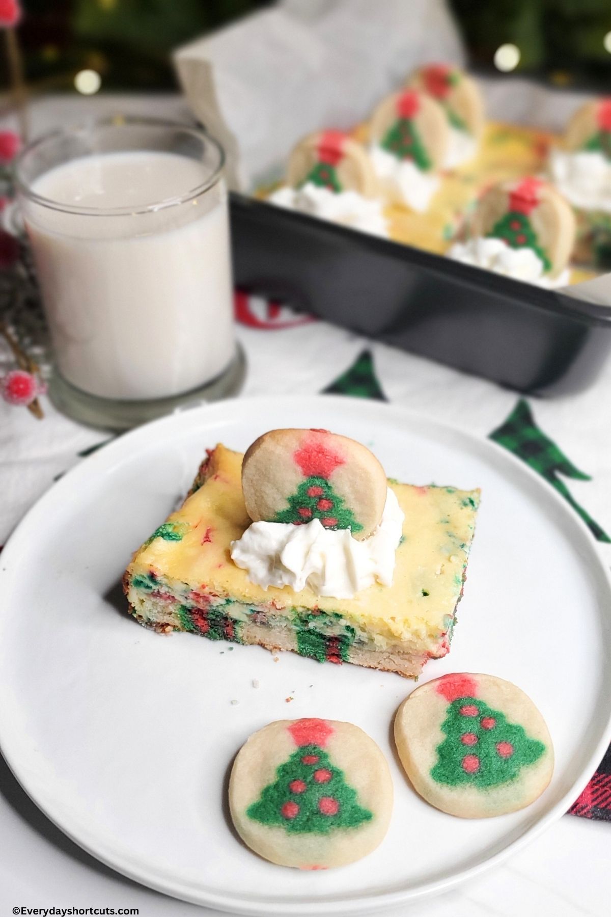 sugar cookie on top of cheesecake cookie bars