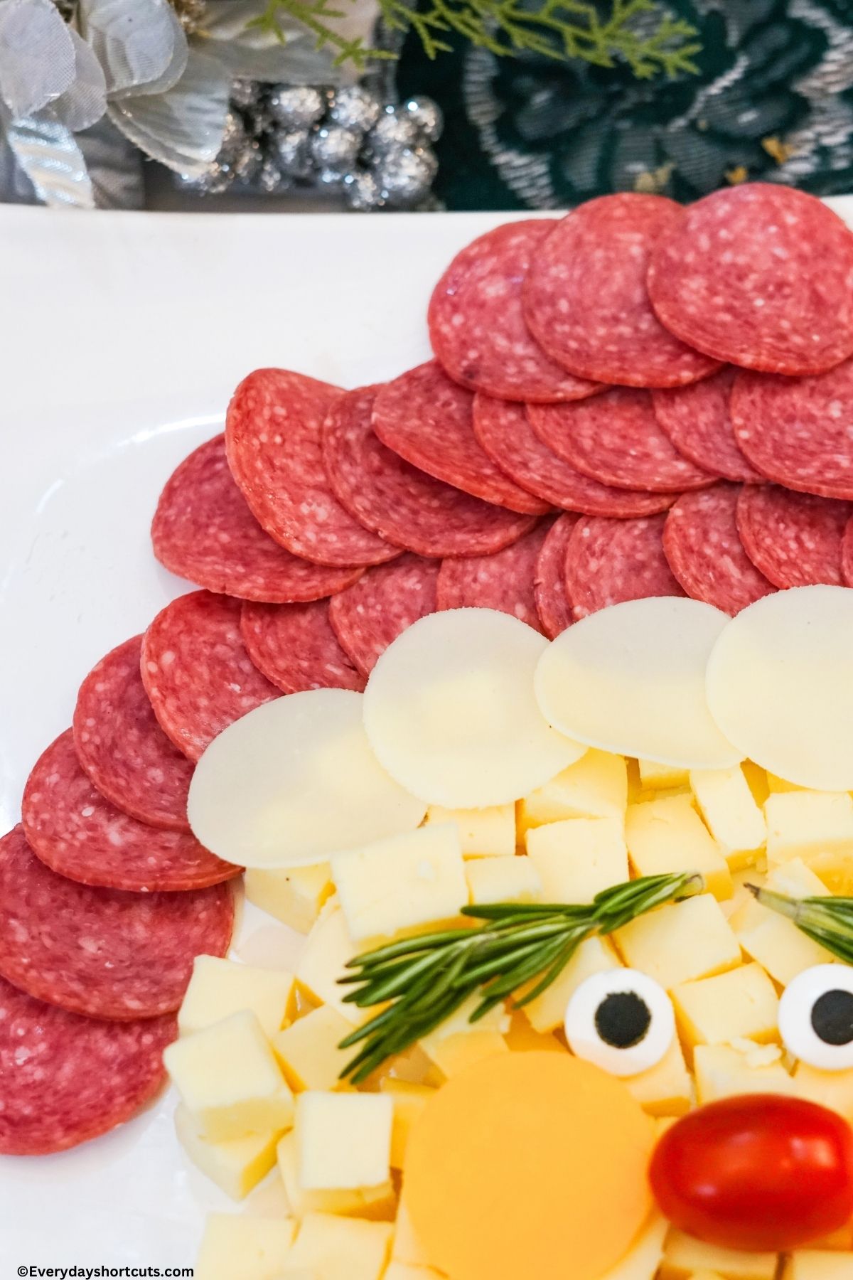 Santa hat made with pepperoni slices