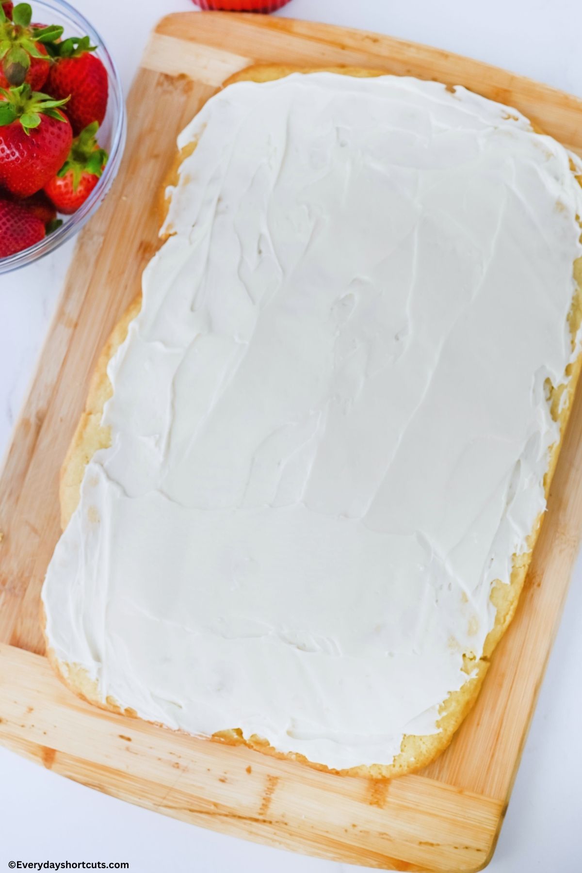 frosting spread on a baked sugar cookie