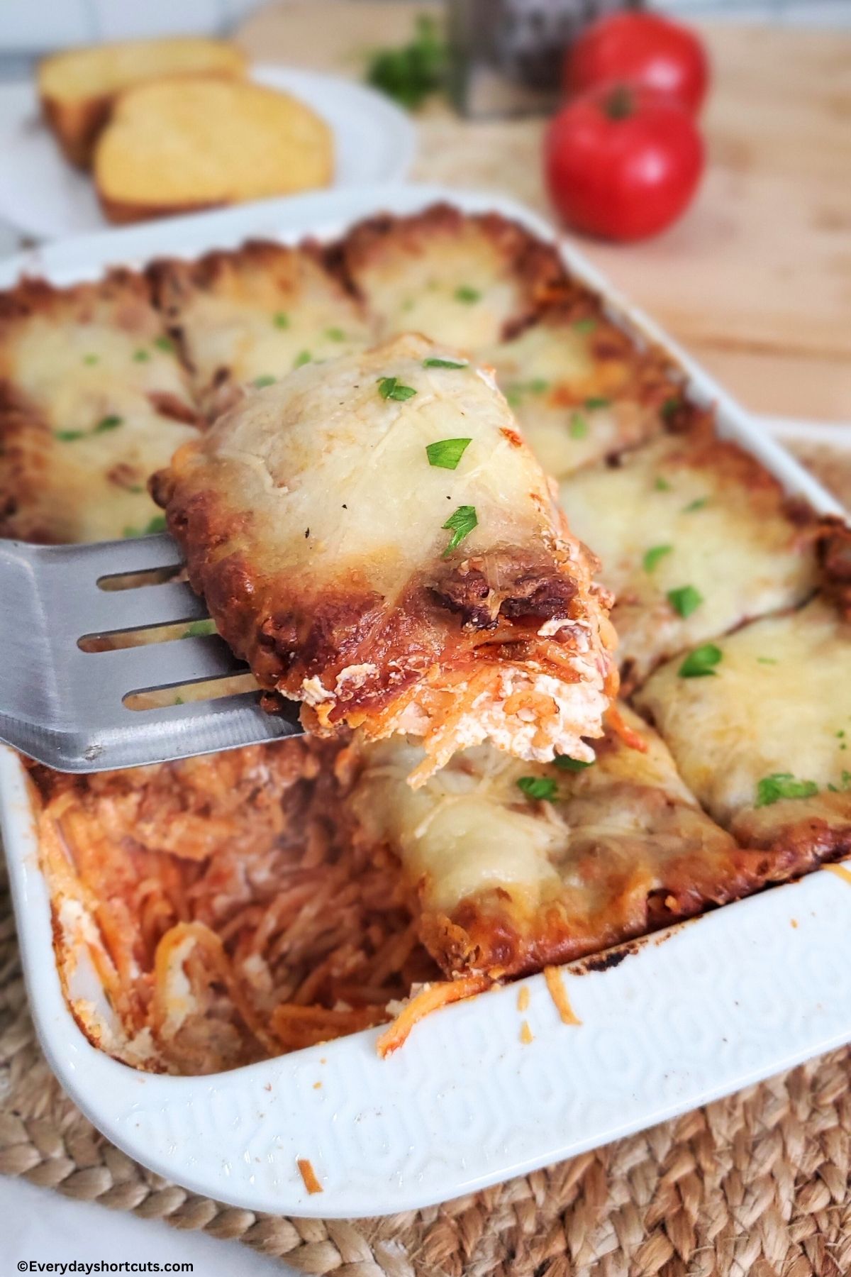slice of creamy noodle casserole on a spatula