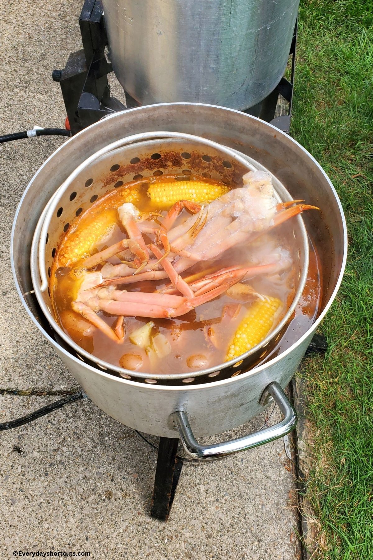 seafood boil in a stock pot on an outdoor burner