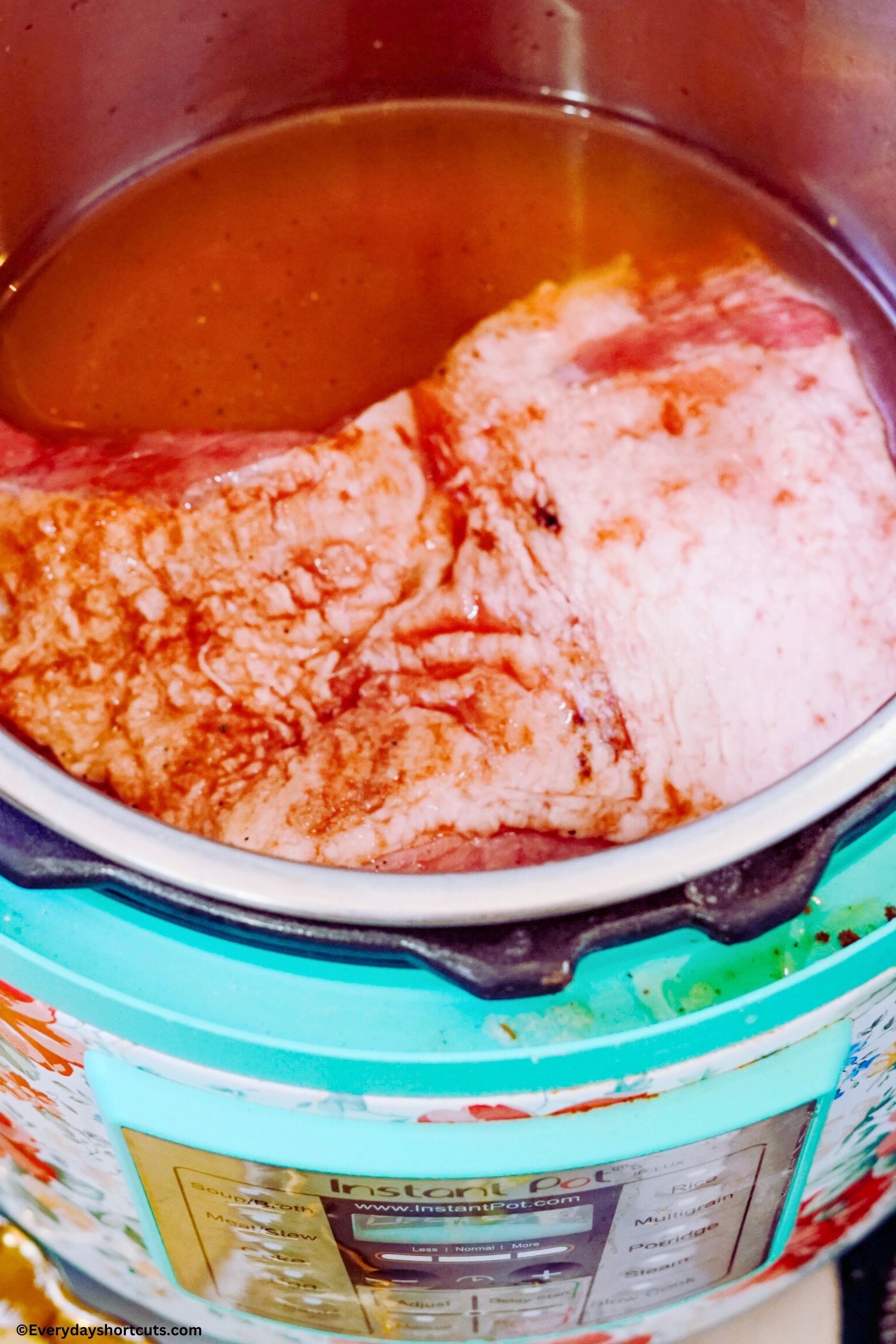corned beef brisket in an Instant Pot with beef broth