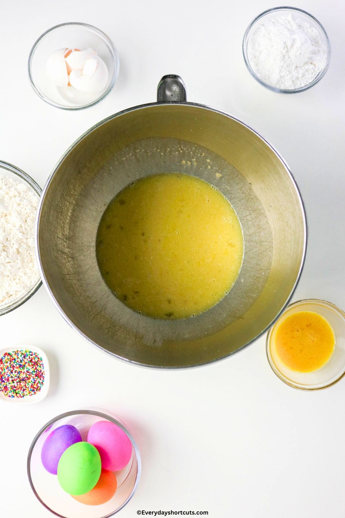 yeast and eggs in a kitchen aid mixer bowl