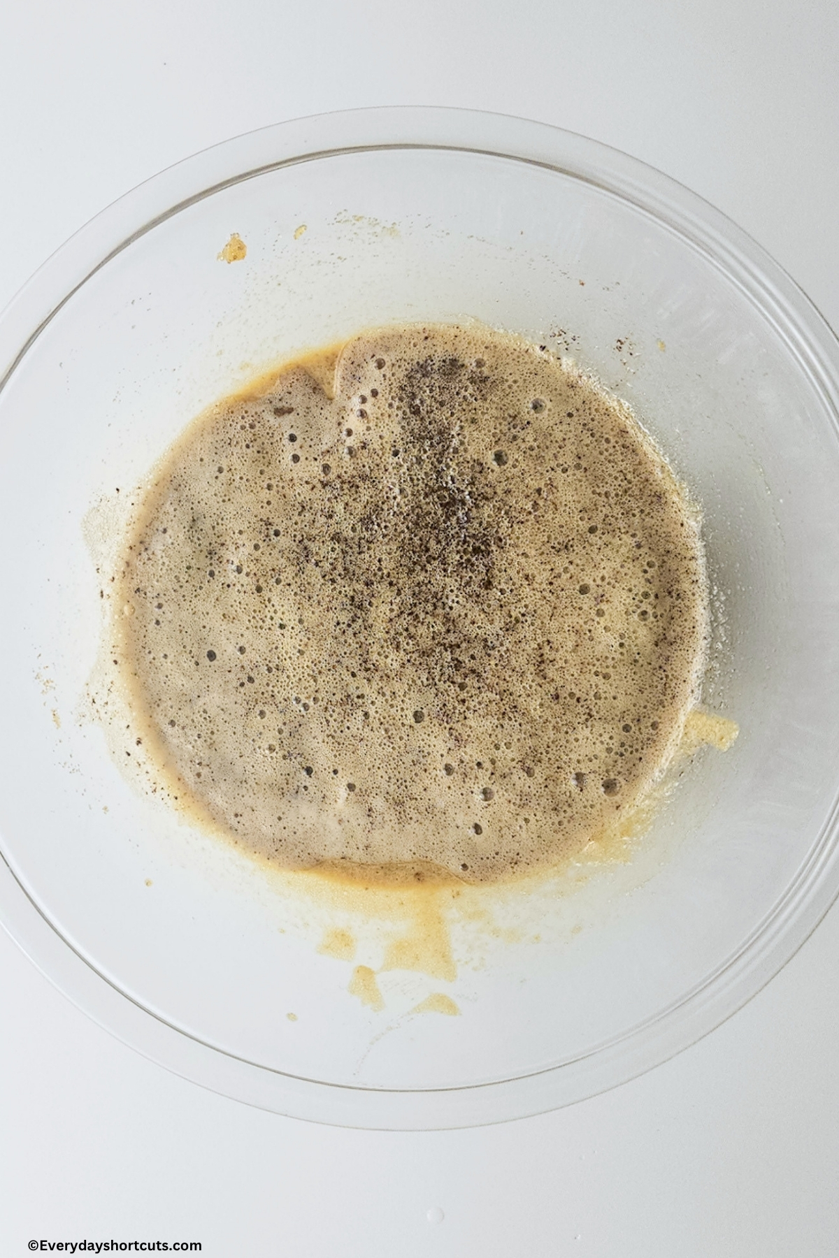 egg yolks, white sugar and brown sugar in a bowl