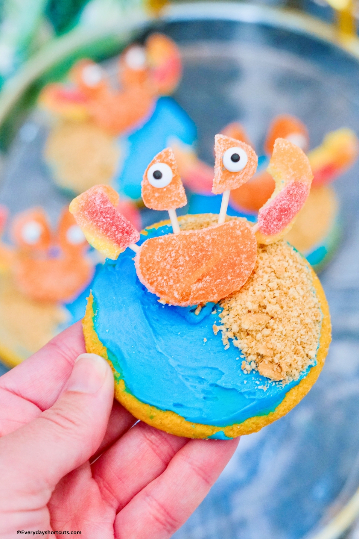 holding a beach crab cookie