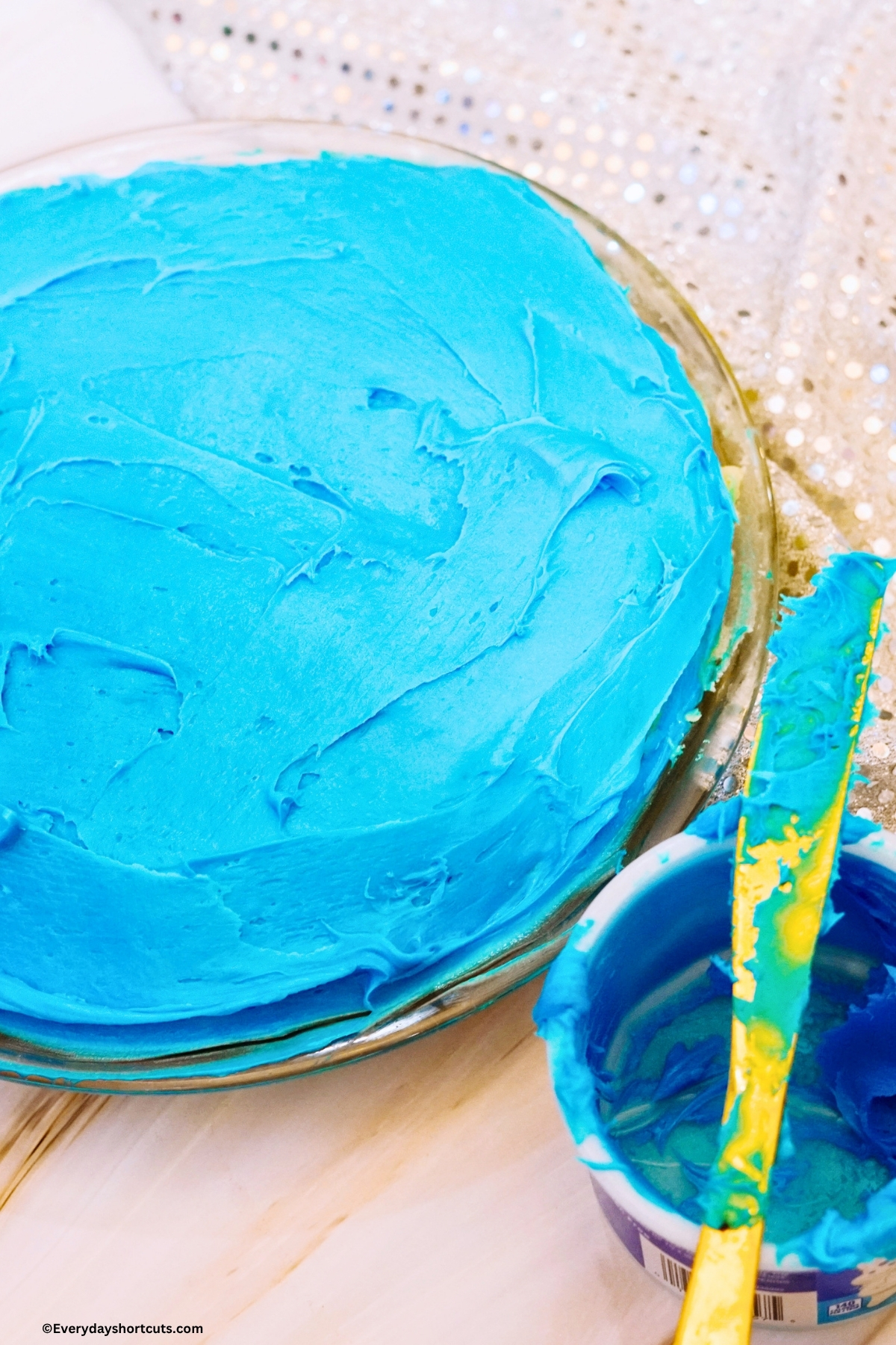 round cake frosted in blue icing