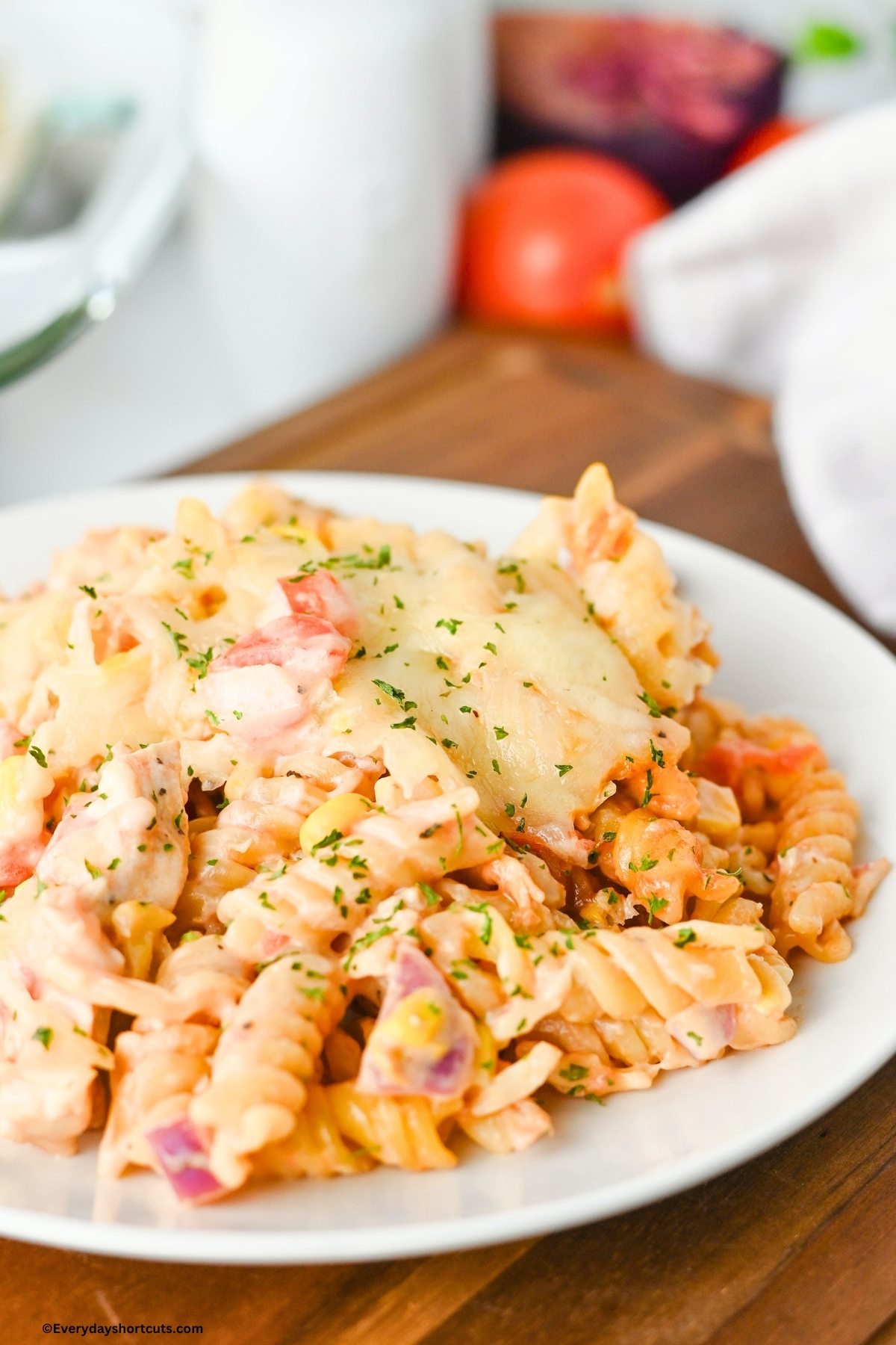 close up of chicken BBQ ranch pasta on a white plate