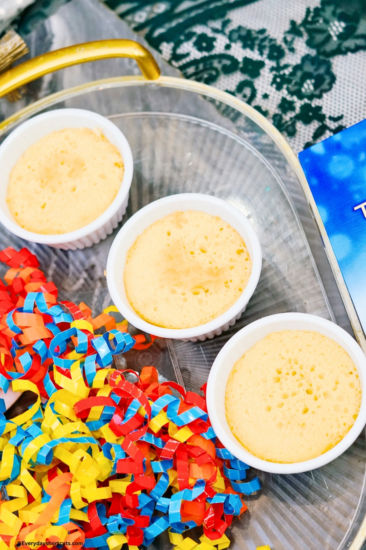 baked yellow cakes in ramekin bowls