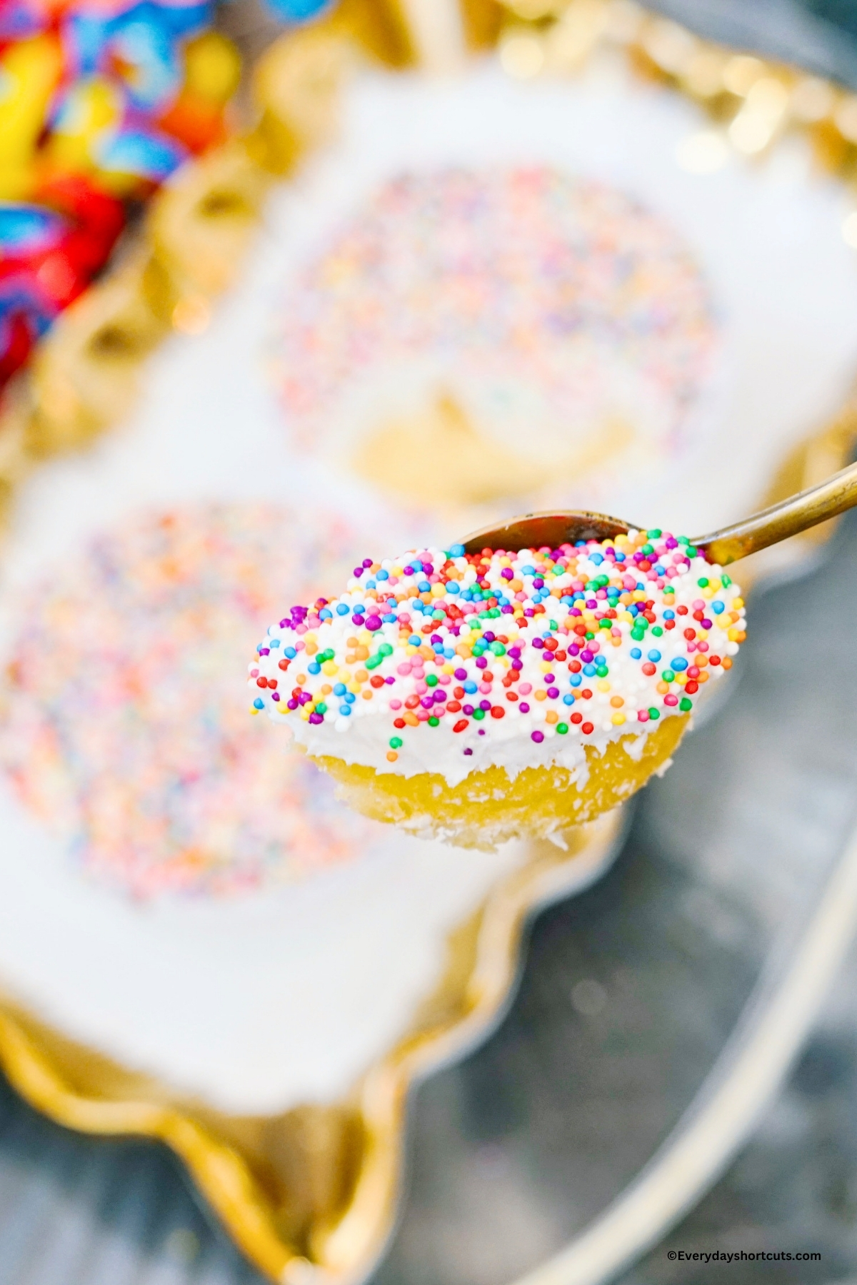 a piece of dot cake on a spoon