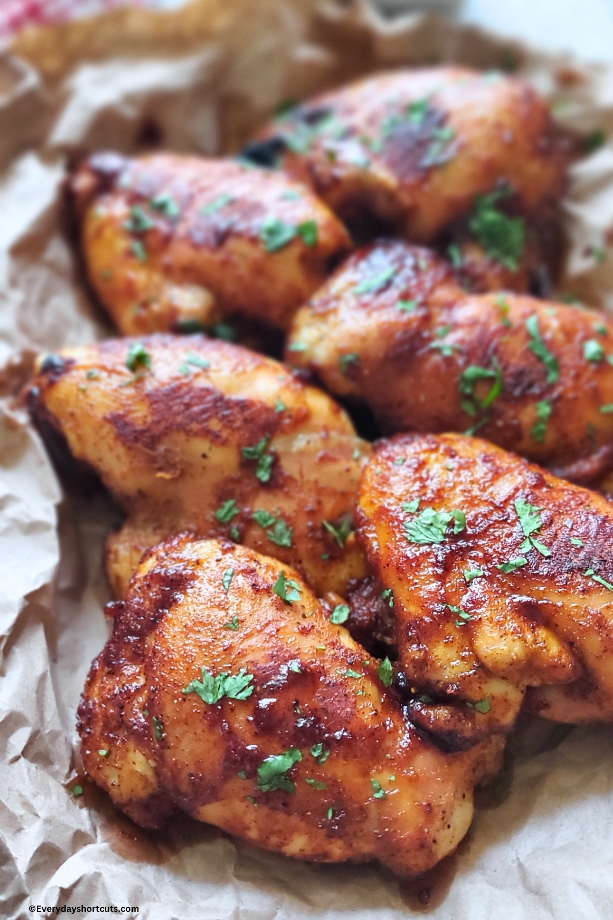 up close hot honey chicken garnished with parsley flakes