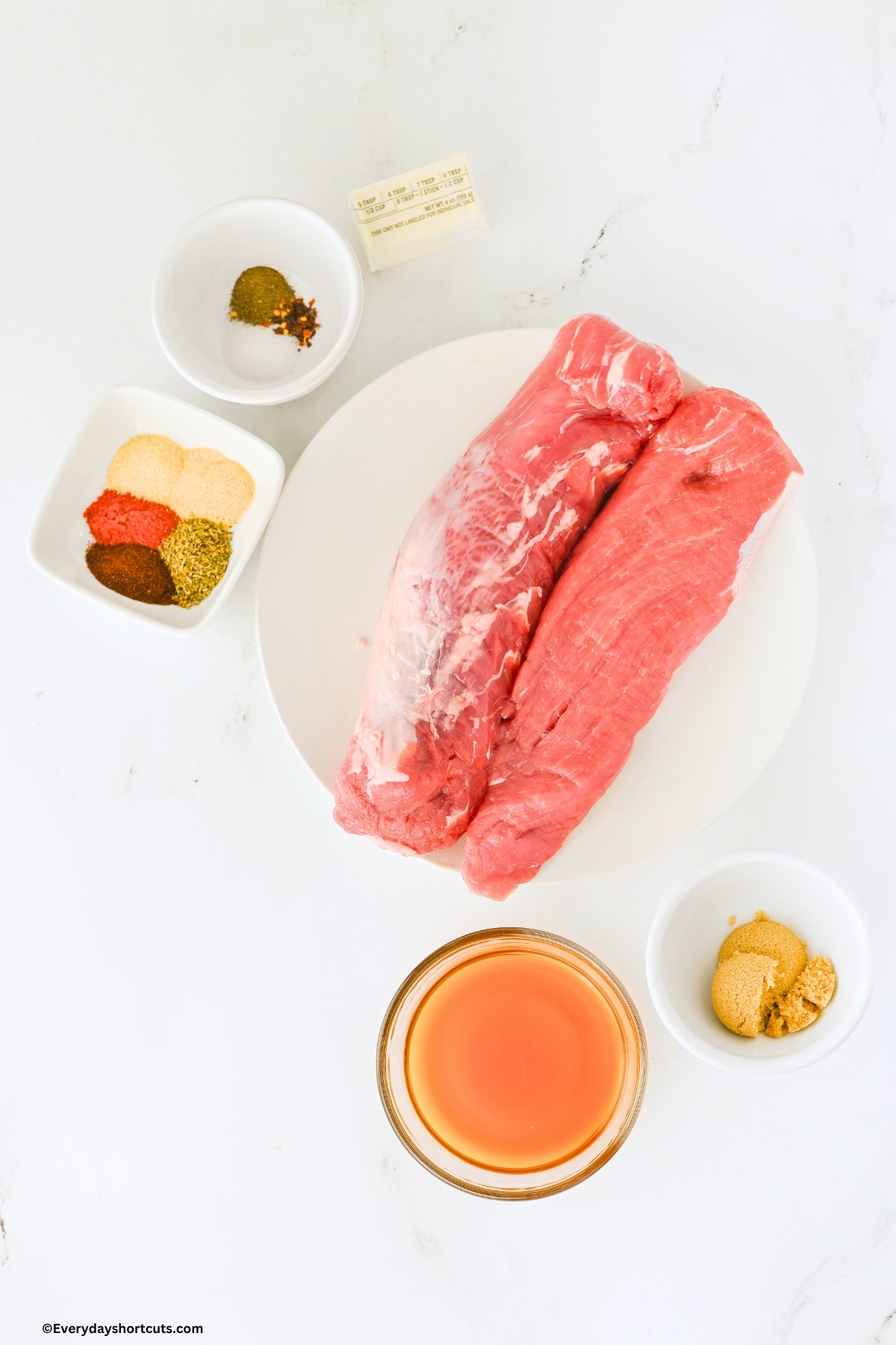 ingredients shown: Pork Tenderloin, Beef Broth, Brown Sugar, Butter, Smoked paprika, garlic powder, onion powder, chili powder, Italian seasoning, salt and red pepper flakes
