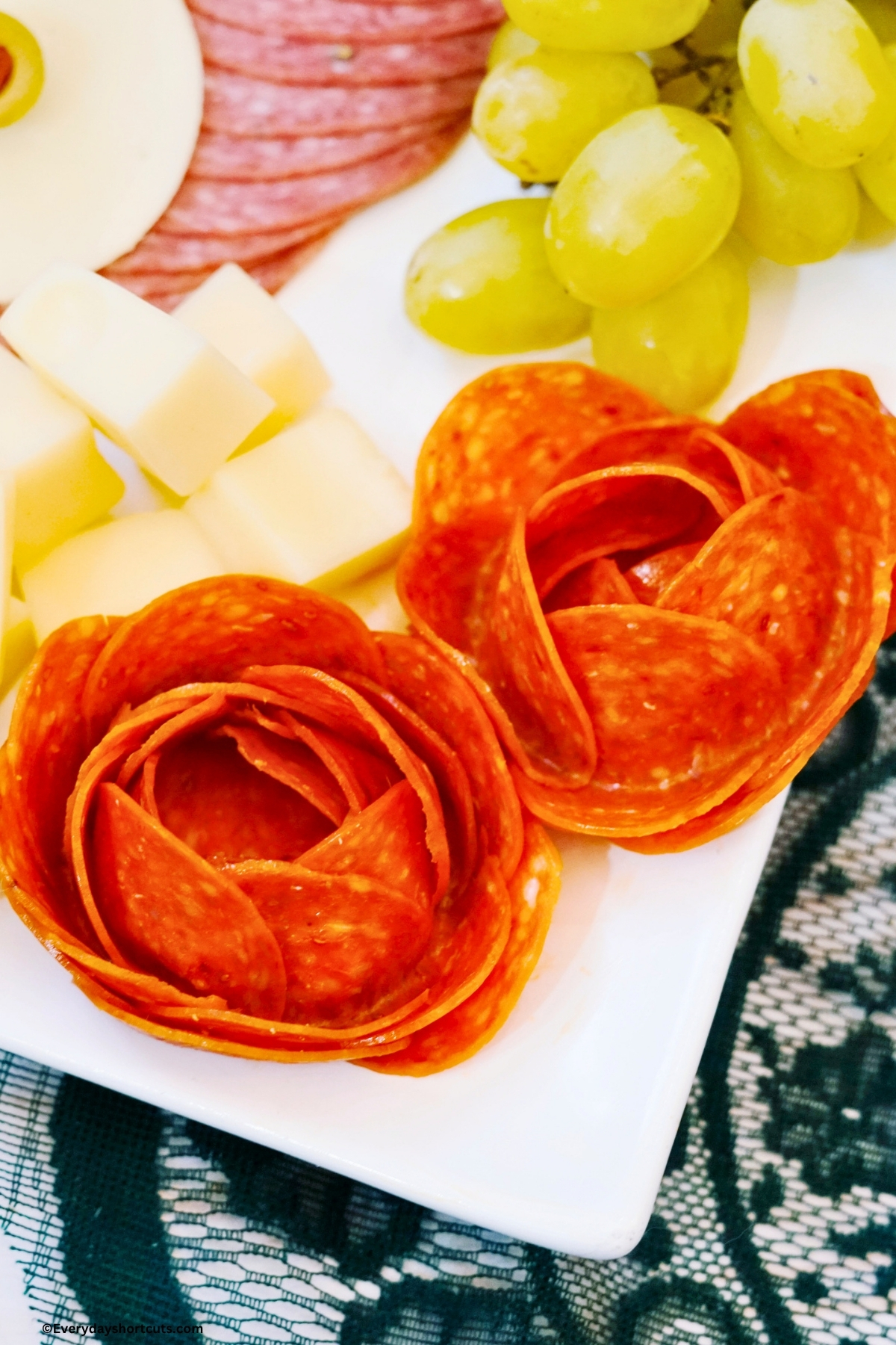 meat roses on a charcuterie board