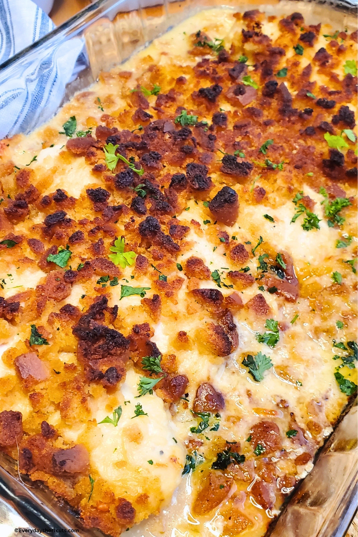 up close of Caesar chicken in a casserole dish