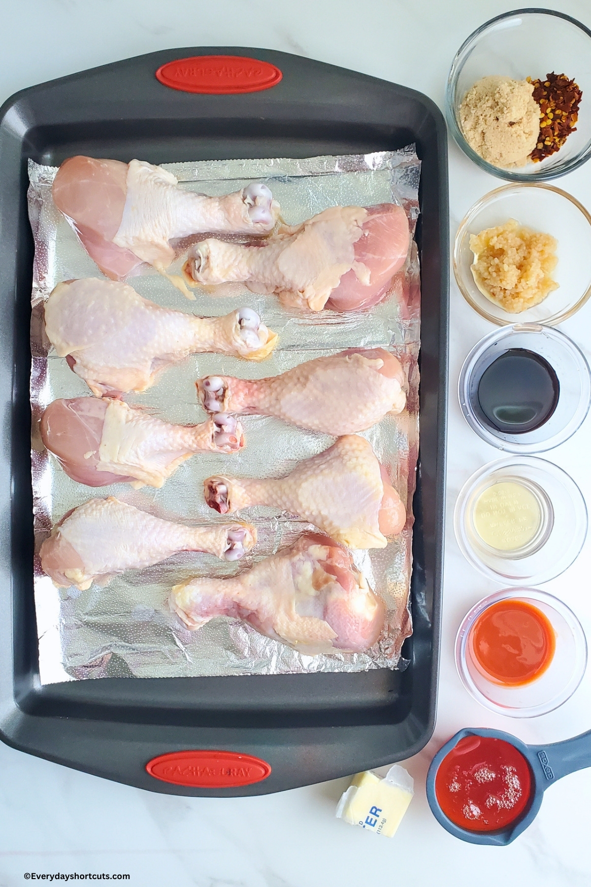 ingredients shown: chicken drumsticks, butter, honey, redhot, apple cider vinegar, soy sauce, red pepper flakes, brown sugar and mince garlic