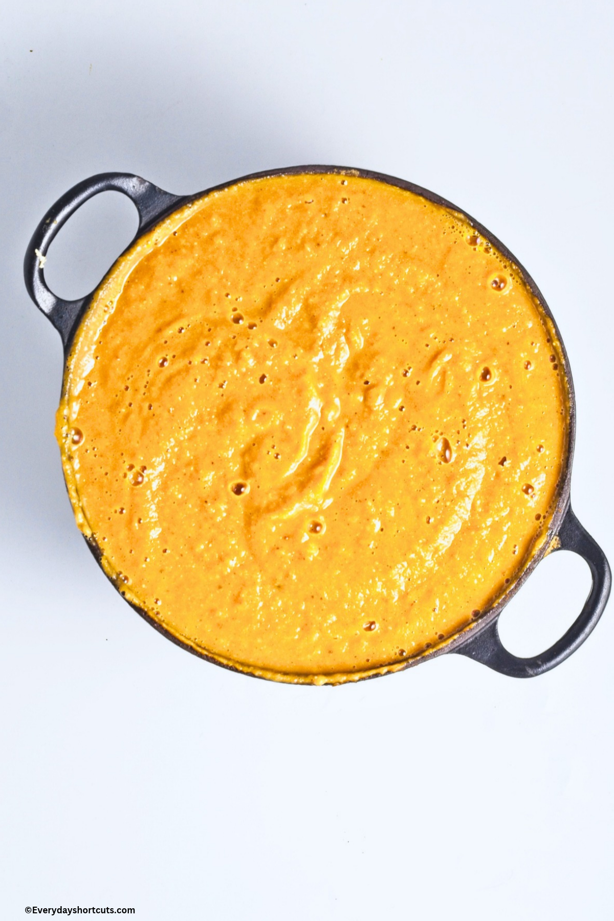 blended pumpkin soup in a pan