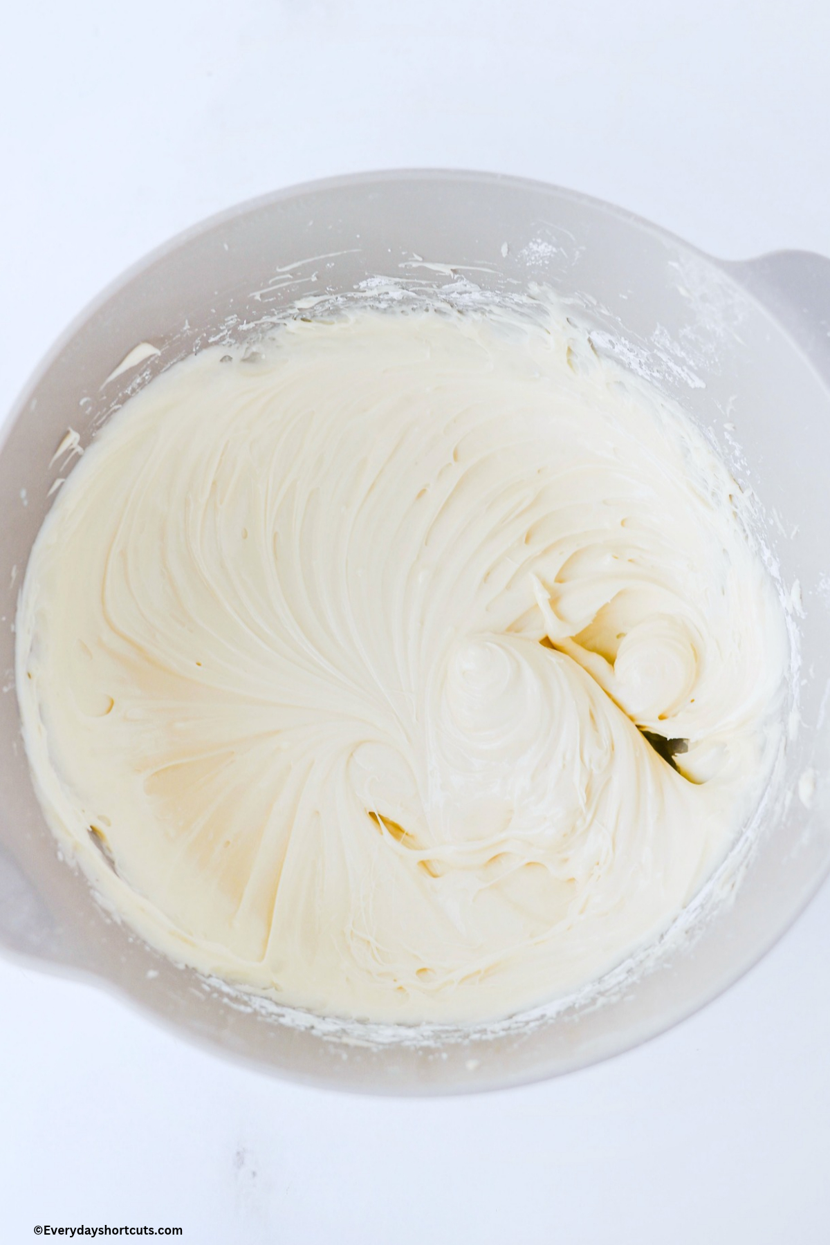 whipped frosting mixture in a bowl