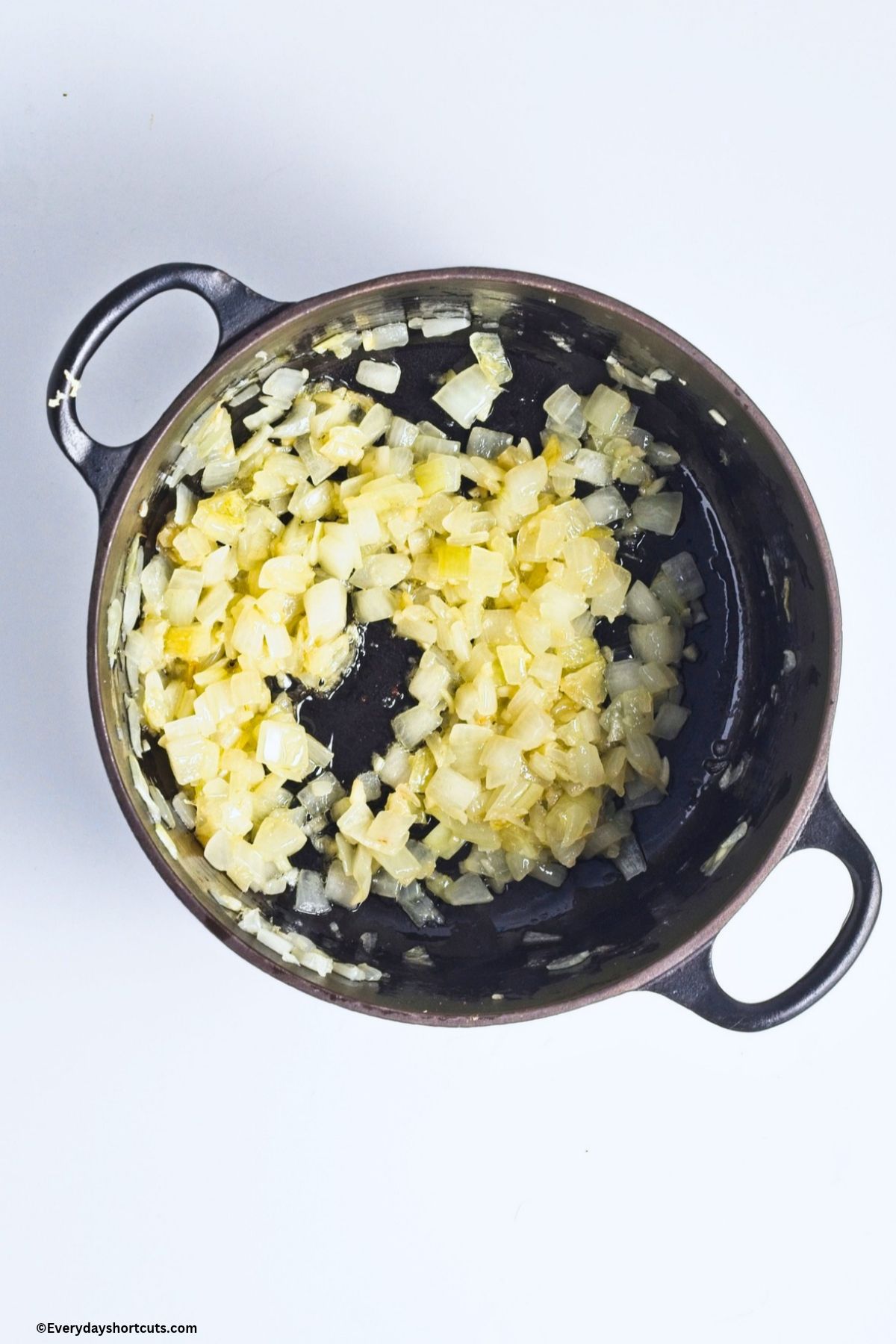 onion and minced garlic cooked in a pan