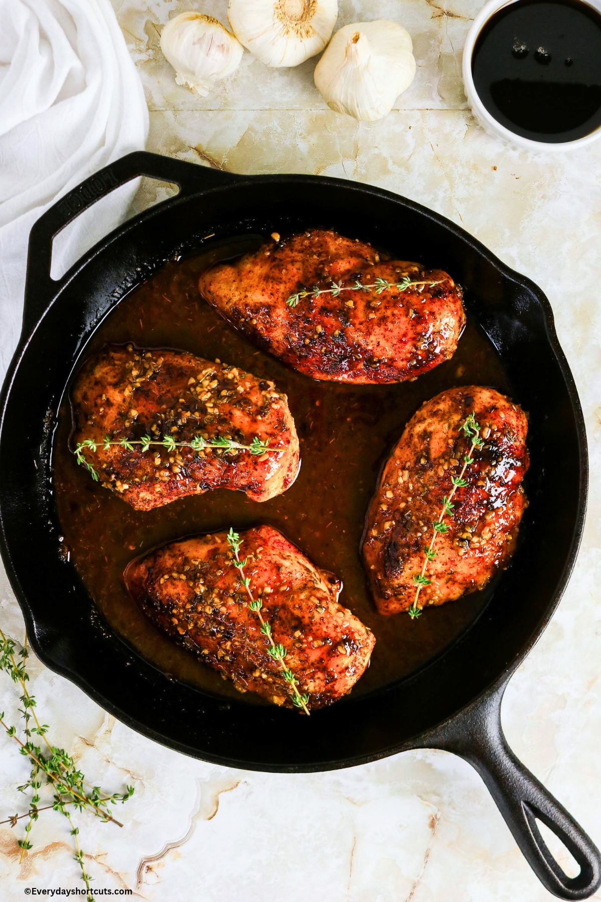baked maple dijon chicken in a cast iron skillet