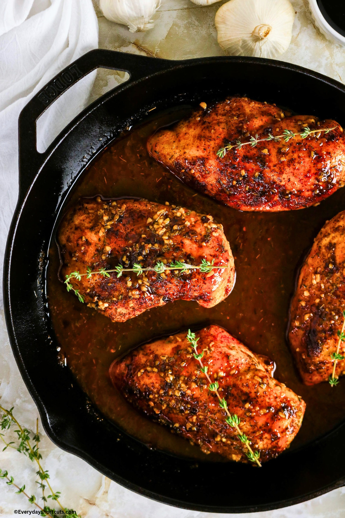 maple mustard glazed chicken in a cast iron skillet